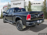 The 2014 Ram 3500 Laramie is a heavy-duty pickup truck that blends robust capability with a comforta... (image 3)