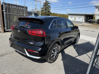 Check out this stylish 2019 Kia Niro EX Premium SUV! With a sleek black exterior and interior, this... (image 2)