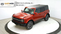Experience the power and style of the red 2023 Ford Bronco Outer Banks 4 Door Advanced 4x4, boasting... (image 8)