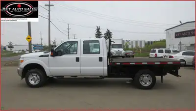 2015 Ford F-350 Flatbed Truck 4X4 Low Km's AMVIC LICENSED..... Ask for Special Financing & Leasing d...