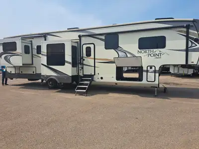 Looking for a High-end Fifth Wheel that looks new? The North Point has a comfortable raised living r...