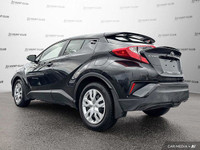 This 2022 Toyota C-HR, sleek and stylish in black, offers a practical blend of city-slick driving an... (image 3)