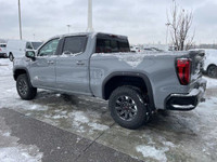 The 2025 GMC Sierra 1500 AT4X in Thunderstorm Grey Metallic is a formidable off-road truck that seam... (image 4)