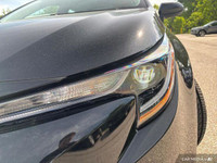 This sleek 2022 Toyota Corolla LE sedan in Black Sand Pearl is ready to enhance your daily commute.... (image 9)