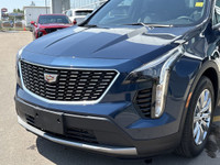 Finished in Twilight Blue Metallic and riding on stylish 18-inch aluminum wheels, this 2021 Cadillac... (image 2)