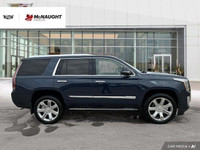 The 2017 Cadillac Escalade includes four-wheel drive, a hands-free power liftgate, an adaptive suspe... (image 5)