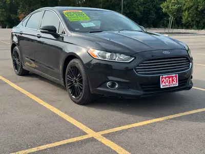 2013 FORD FUSION SE , 4CYL 1.6L ENGINE SUN ROOF ……. GAS SAVER ……. HEATED SEATS BACK UP CAMERA ……. LE...