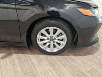Locally Owned Vehicle! The 2019 Toyota Camry LE in sleek black with front-wheel drive delivers a bal... (image 9)