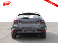 This 2023 Mazda MAZDA3 GT AWD is a sleek and stylish hatchback with a stunning red interior that's s... (image 2)