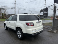 This 2014 GMC Acadia SLE-2 is a spacious and reliable SUV with a sleek white exterior and a comforta... (image 2)