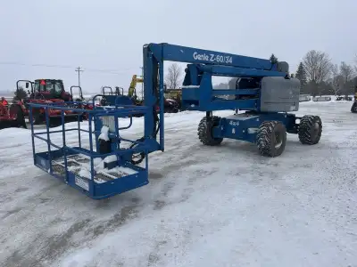 Articulating man lift, 2008 Genie model Z60/34. This boom lift has a platform height of 60 feet givi...