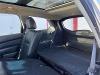 KBB.com 12 Best Family Cars. This Nissan Pathfinder boasts a Intercooled Supercharger Gas/Electric I... (image 9)