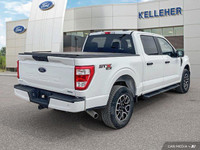 Unleash the power and capability of this 2022 Ford F-150 Crew Cab pickup. Boasting a robust 2.7L V6... (image 4)