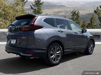 This sleek 2021 Honda CR-V Sport SUV, boasting a stunning Modern Steel Metallic exterior and only 33... (image 5)