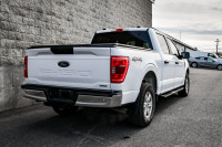 This 2021 Ford F-150 is for sale today. This Crew Cab 4X4 pickup has 110,911 kms. It's white in colo... (image 2)