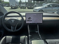 This Tesla Model 3 boasts a Electric engine powering this Automatic transmission. Window Grid Antenn... (image 9)