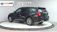 The 2024 Ford Explorer Limited 4WD in sleek black is a robust yet stylish SUV designed to conquer bo... (image 2)