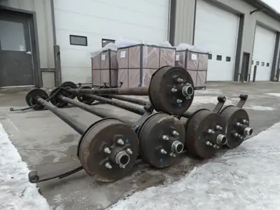 3500 lb trailer axles for sale, equipped with spring suspension and electric brakes. 80 inch spring...