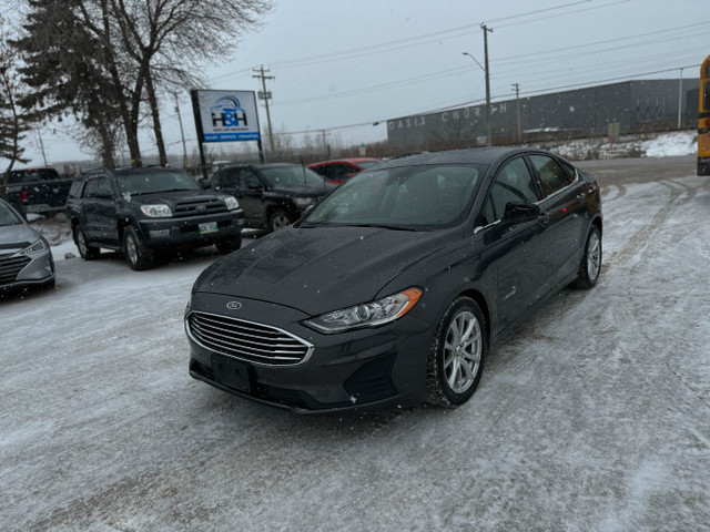 CLEAN TITLE, SAFETIED. 2019 Ford FUSION HYBRID in Cars & Trucks in Winnipeg - Image 2