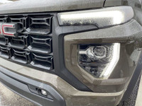 The 2024 GMC Canyon Elevation in Deep Bronze Metallic is a rugged and capable mid-size truck. Its bo... (image 2)