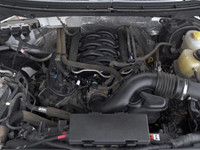 The 2014 Ford F-150 in pristine white is a robust 4x4 truck designed for those who demand power and... (image 6)