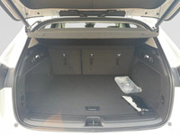 This 2025 Buick Envision in Summit White is equipped with AWD and Turbocharged Gas I4 2.0L/- TBD – e... (image 9)
