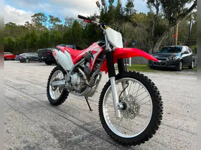 EMBARK ON AN EPIC OFF-ROAD JOURNEY WITH THE HONDA CRF 250F PAYMENTS ONLY $69 BI-WEEKLY OAC!! APPLY T...