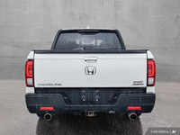 Experience truck versatility with SUV comfort in this 2021 Honda Ridgeline, a unique and capable pic... (image 5)