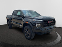 This 2025 GMC Canyon in Onyx Black is equipped with 4WD and Turbocharged Gas I4 2.7L/ engine. The GM... (image 6)