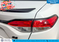 Sporty and compact, our 2022 Toyota Corolla SE Sedan has a lively spirit and looks great in Super Wh... (image 9)