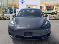 This Tesla Model 3 delivers a Electric engine powering this Automatic transmission. Window Grid Ante... (image 7)