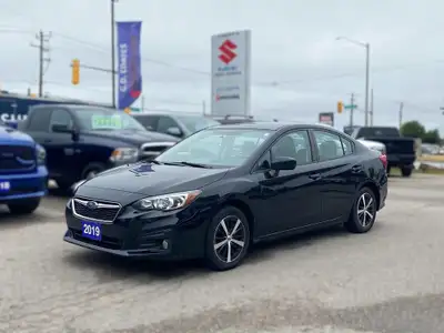 2019 Subaru Impreza 2.0i Sport - Your Ticket to Sporty Shenanigans! Condition: Used, Certified, and...