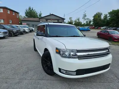 The 2018 Ford Flex SEL is a bold and versatile SUV that stands out with its distinctive boxy design...