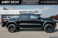Get ready to conquer the road with the 2023 Chevrolet Colorado 4WD Trail Boss. This commanding black... (image 2)