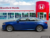 Experience effortless driving with this 2022 Honda Civic Sedan EX, boasting a sleek blue exterior an... (image 1)