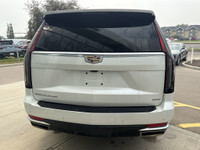 The 2022 Cadillac Escalade stands tall with commanding style and capability, finished in Crystal Whi... (image 6)