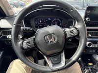 The 2022 Honda Civic Sedan Touring combines sleek styling, advanced technology, and impressive perfo... (image 9)