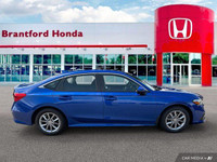 Experience effortless driving with this 2022 Honda Civic Sedan EX, boasting a sleek blue exterior an... (image 6)