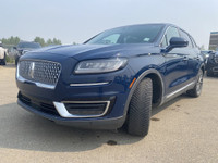Under the glistening Rhapsody Blue exterior, the 2019 Lincoln Nautilus Reserve stands as a testament... (image 2)