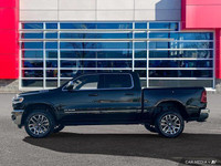 This Ram 1500 has a trusty Twin Turbo Premium Unleaded I-6 3.0 L/183 engine powering this Automatic... (image 1)
