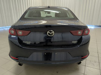 Our bold 2024 Mazda3 2.5 GT Sedan creates a finely balanced harmony between car and driver in Deep C... (image 6)