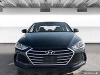 The 2017 Hyundai Elantra in Space Black Pearl features heated front seats, a heated leather steering... (image 8)