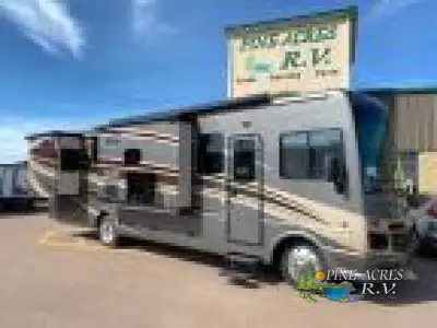 The Bounder 34T motor home by Fleetwood RV offers triple slides. This motor home is quite spacious,...