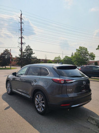 This 2022 Mazda CX-9 Grand Touring AWD is a sleek and spacious SUV that's perfect for your family ad... (image 2)