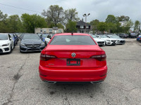 C ome by and check out this eye-catching 2019 Volkswagen Jetta Highline with a bold red exterior and... (image 2)
