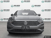 Meet the 2021 Volkswagen Jetta Comfortline in a stunning gray finish, featuring a Front-Wheel Drive... (image 2)