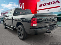 Command attention with this powerful 2022 Ram 1500 Classic Express Crew Cab, boasting a sleek Diamon... (image 3)