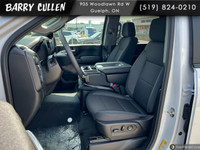 The 2025 Chevrolet Silverado 2500HD Custom in pristine white with a robust 44 drivetrain is designed... (image 4)
