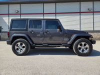 6 Speed manual transmission Jeep Sahara upgraded with Lift Kit, 33" Falken Wildpeak All Terrain tire... (image 7)