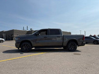This Ram 1500 has a durable Regular Unleaded V-6 3.6 L/220 engine powering this Automatic transmissi... (image 3)